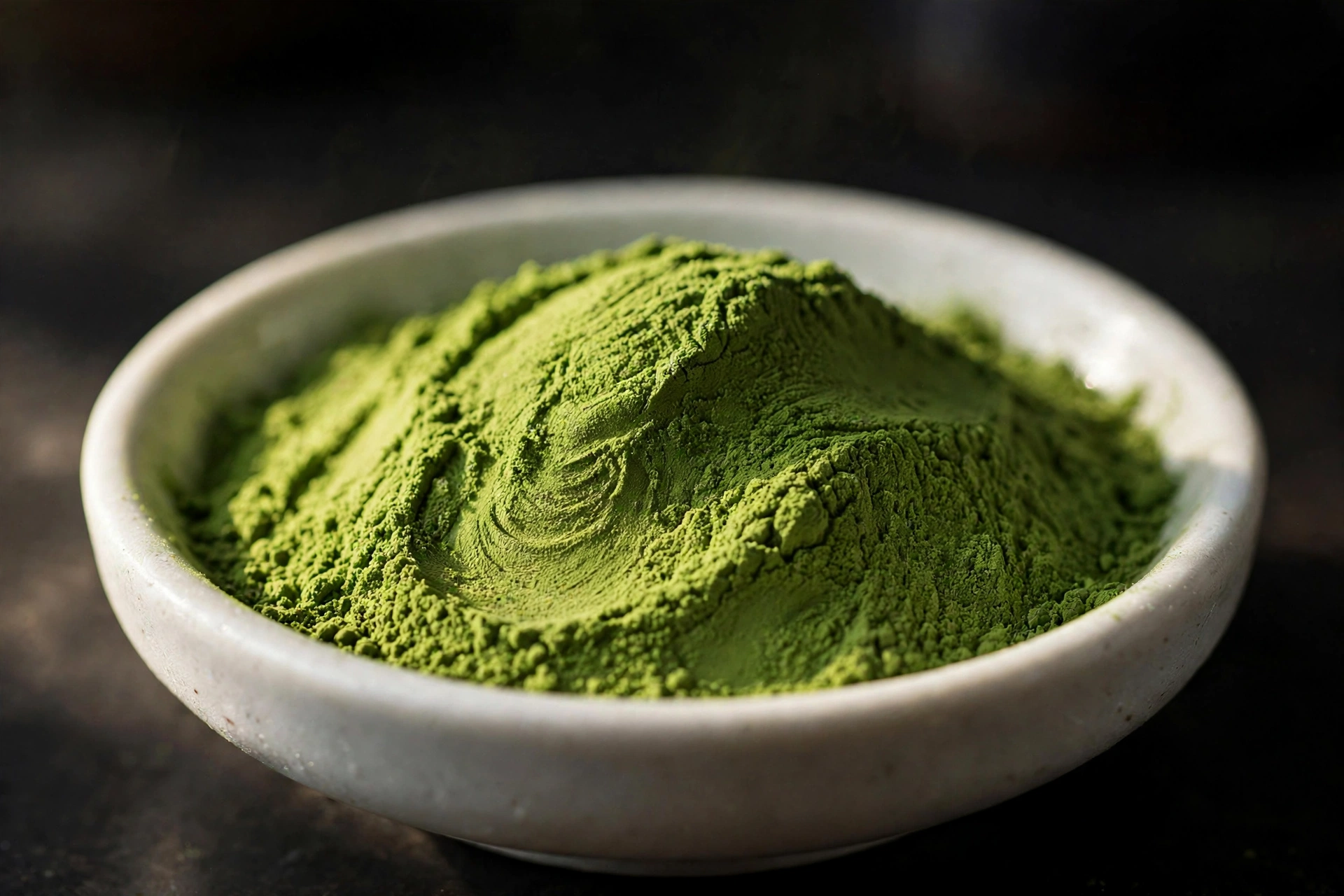 Close-up of fine, silky high-quality matcha powder texture